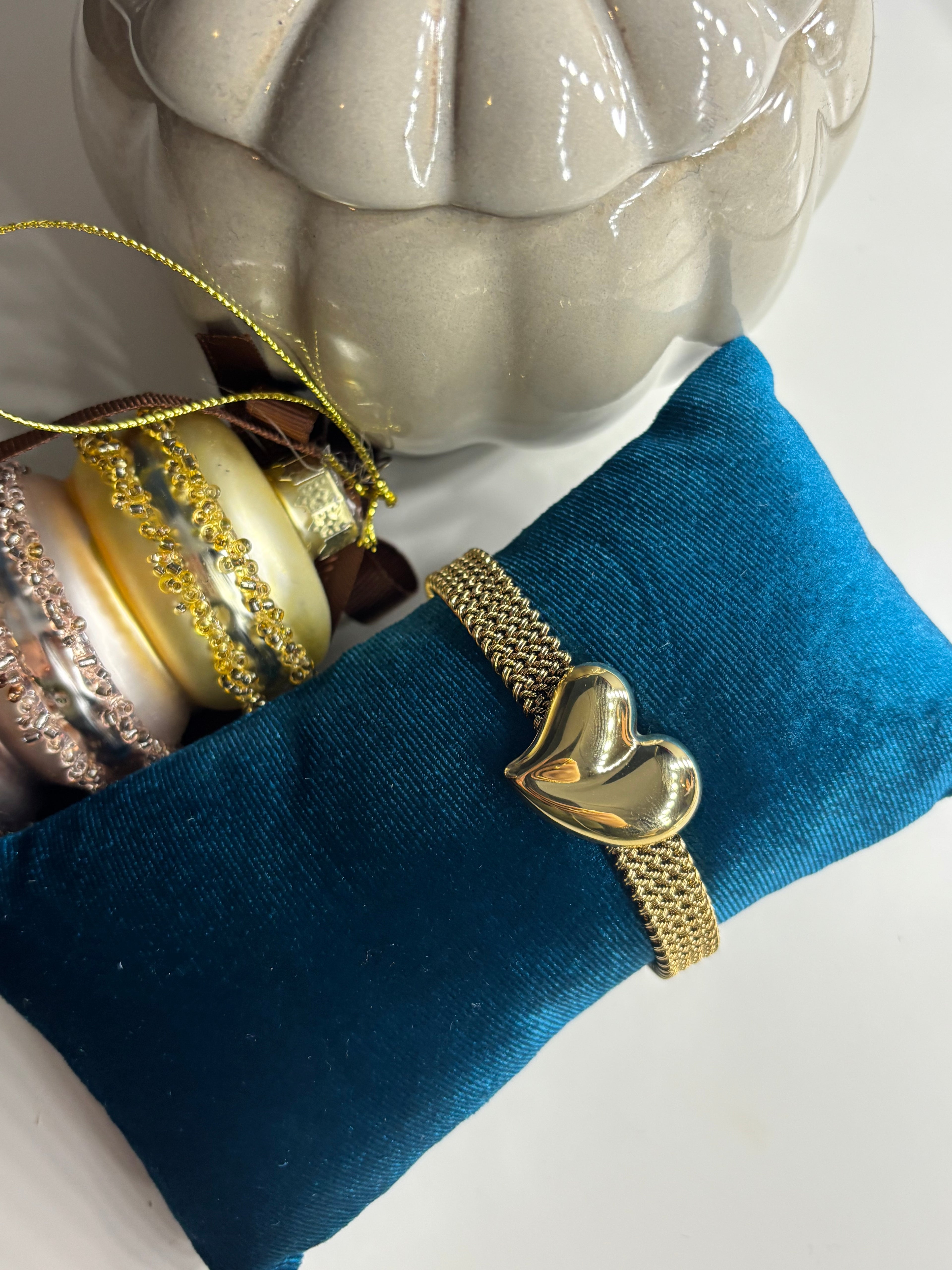 Braided heart bangle