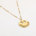 Happy face ketting met parels