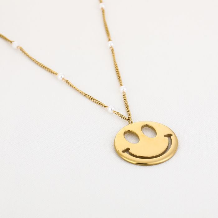 Happy face ketting met parels
